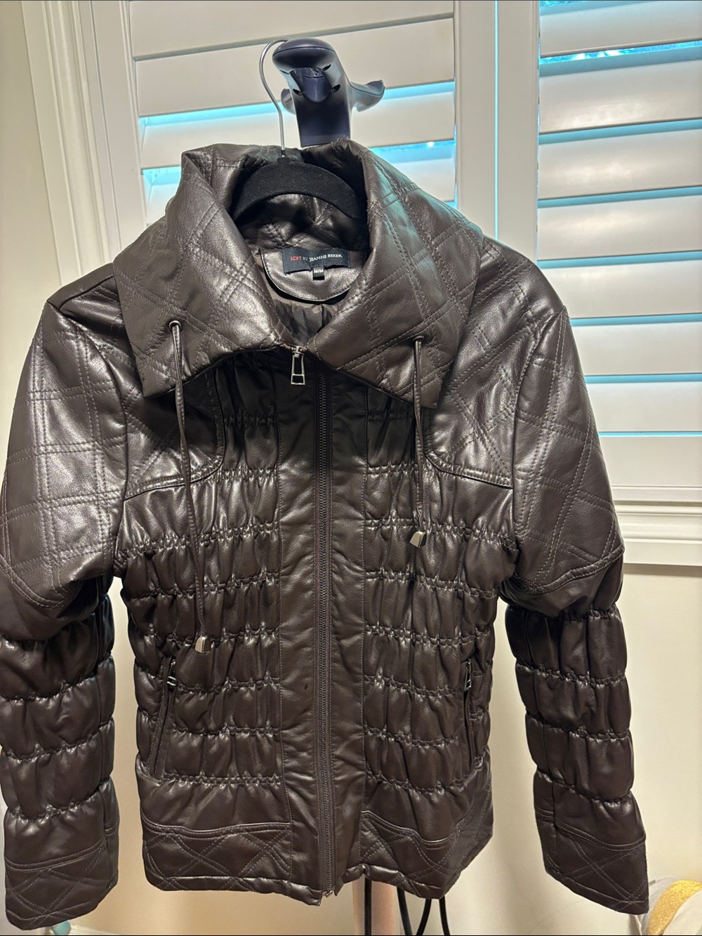 Black Quilted Women's Jacket with High Collar